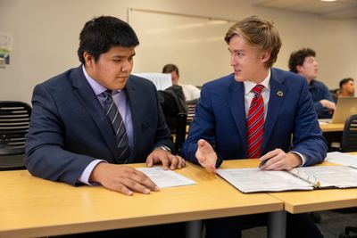 Two NAU students prepare for a mock trial during a Politics and International Affairs project.