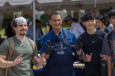 NAU President, José Luis Cruz Rivera, hosts a barbecue to welcome back students to school.