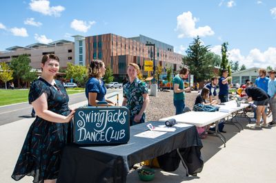 Clubs and organizations line with pedway with tables to promote their club.