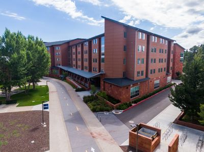 The exterior of the Honors Hall, a residential space for honors students, during a sunny day on NAU Flagstaff campus.