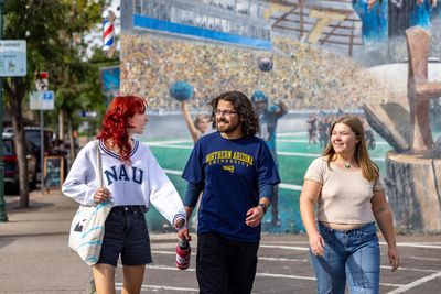 NAU students walk through Downtown Flagstaff.