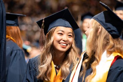 Students celebrating at commencement at NAU.